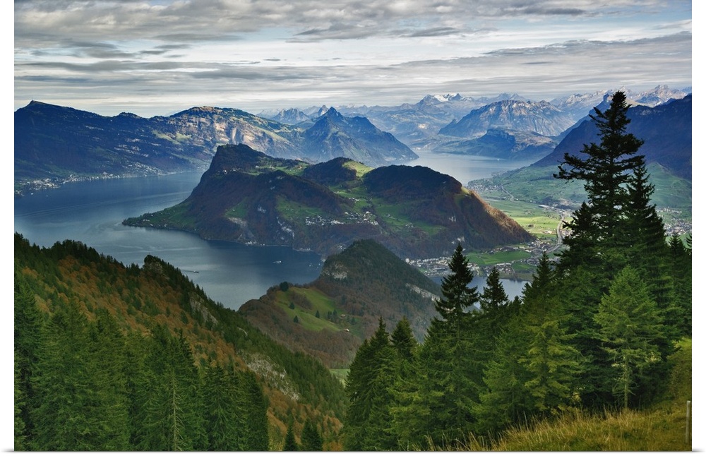 Lake Lucerne surrounded by the Alps and rural countryside viewed from worlds steepest cog train on descent from Pilatus Mo...