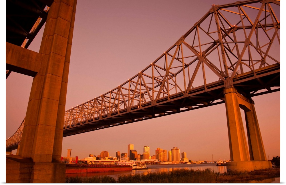 USA, Louisiana, New Orleans. Skyline from the Greater New Orleans Bridge and Mississippi River, dawn.