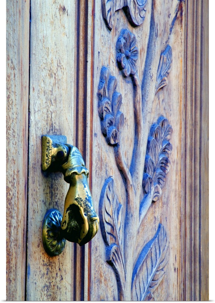 Mexico, San Miguel de Allende, hand-shaped wooden door knocker.