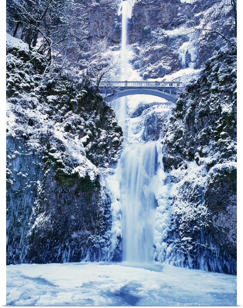Multnomah Falls with snow and ice, winter in Columbia River Gorge.