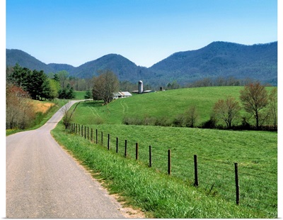 NC, A winding road leads to an isolated farm in the hills near Asheville