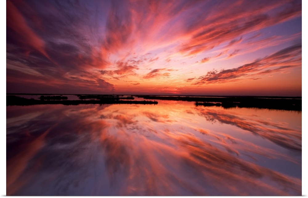 USA, New Jersey, Cape May. Sunset reflection on water.