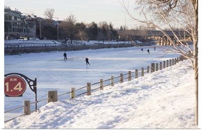 People skating on the frozen canal in winter, Ottawa, Ontario, Canada
