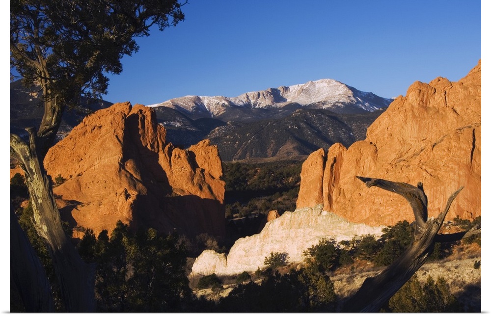 Rock formation and Pikes Peak at Sunrise, Garden of The Gods National Landmark, Colorado Springs, Colorado, USA, February ...