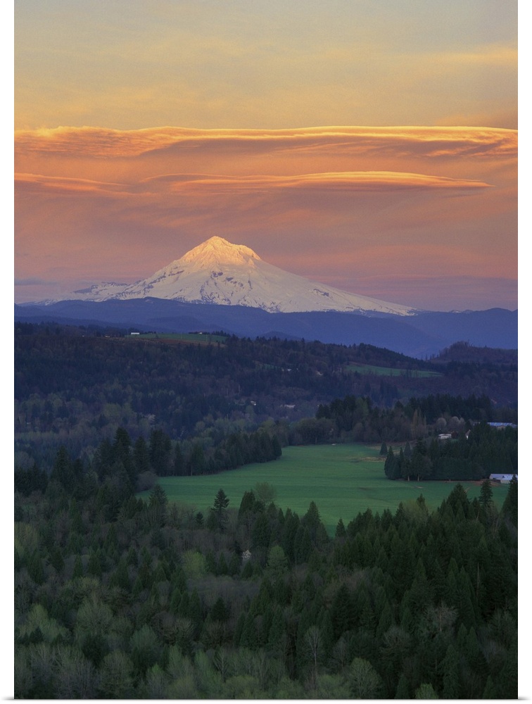 Sunset light colors clouds over Mt Hood, Oregon Cascades.