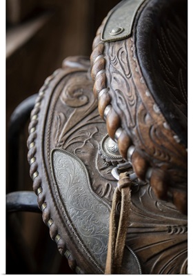 USA, Colorado, Westcliffe, Music Meadows Ranch, Tack Room, Tooled Leather Western Saddle
