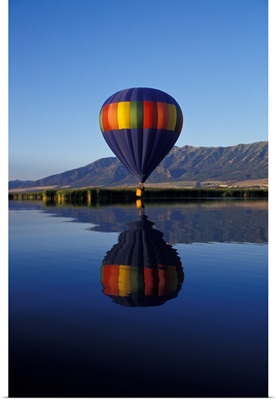 Utah, Cache Valley, Hot air balloon on Logan River Marshes at sunrise