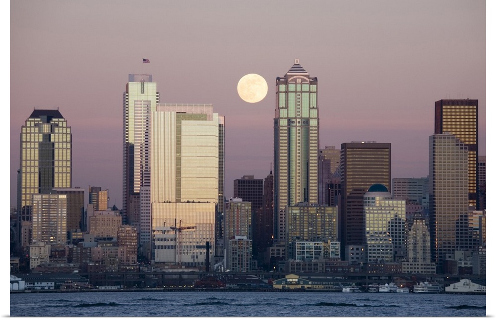 Washington, Seattle skyline and Elliott Bay with full moon rising, view from Alki.