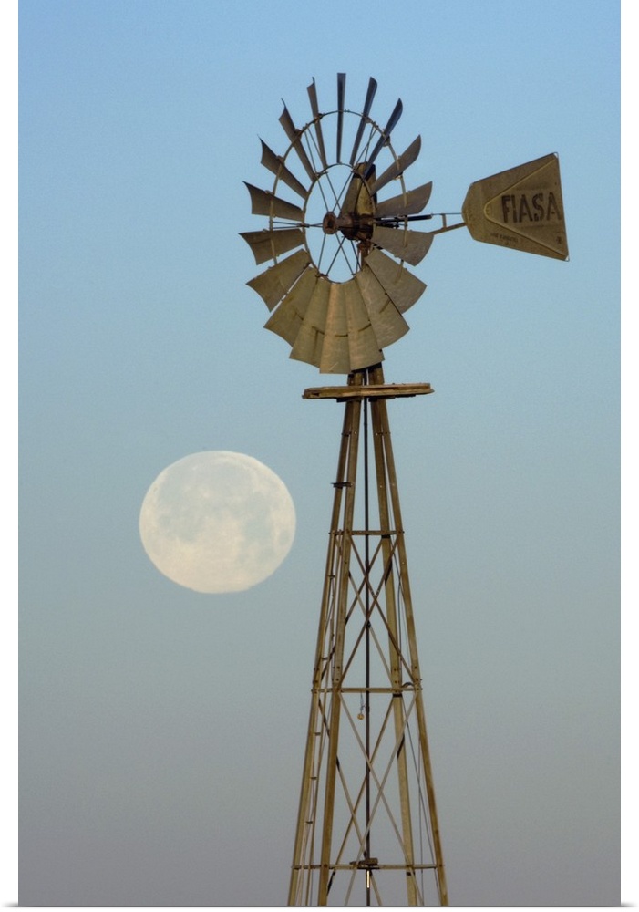 Windmill at sunrise with Full Moon, Canyon, Panhandle, Texas, USA, February 2006