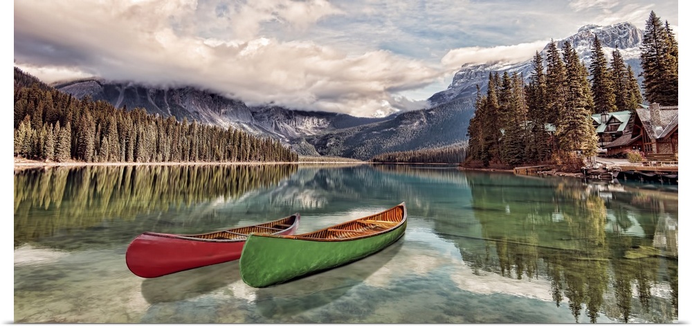Boats on emerald lake in Yoho national park, British Columbia, Canada. It is the largest of Yoho's 61 lakes and ponds, as ...