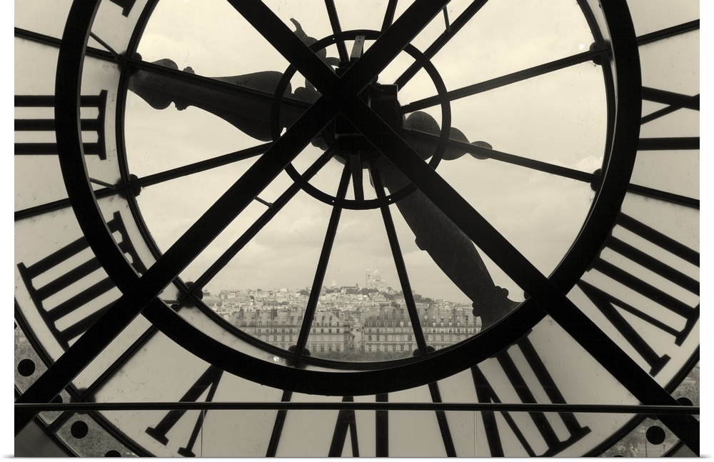 Clock and view of Montmartre, Paris, Ile de France, France.