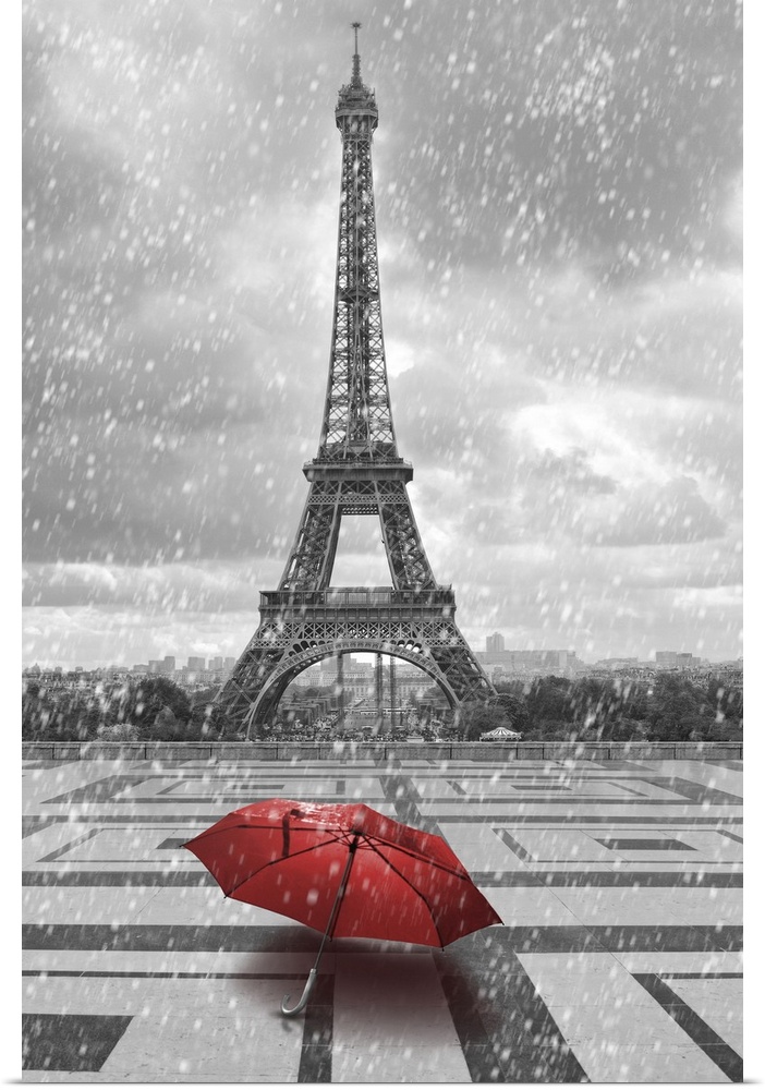 Eiffel tower in the rain with red umbrella. Black and white photo with red element.