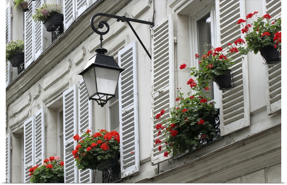 Windows with shutters of old buildings on Montmartre, Paris.