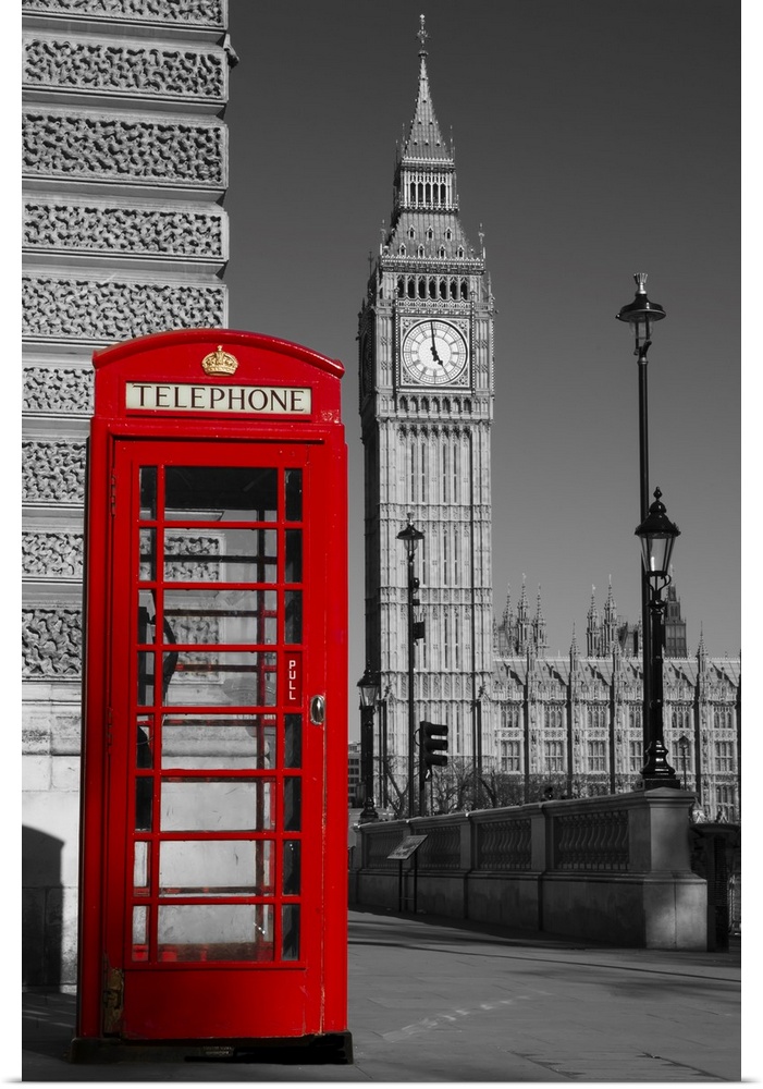 Westminster phone box in color with the palace of Westminster in black and white in the background.