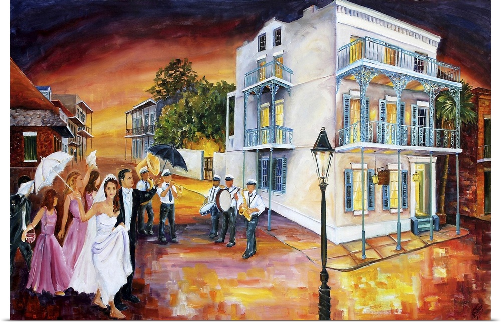 A bride and groom with the bridal party celebrating in the streets of New Orleans.