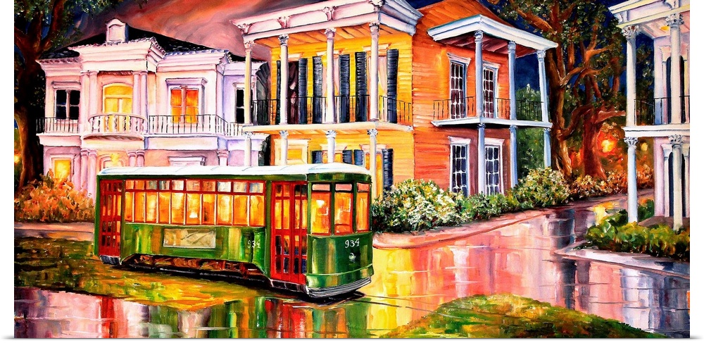 Bright colors are used to paint vintage homes on a street that appears wet as the homes and a trolley reflect in it.