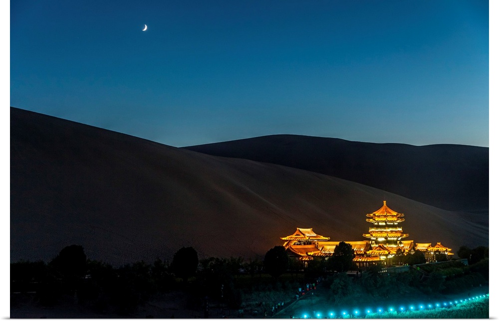 China, Gansu, Dunhuang, Crescent lake and the oasi out of the city of Dunhuang by night.
