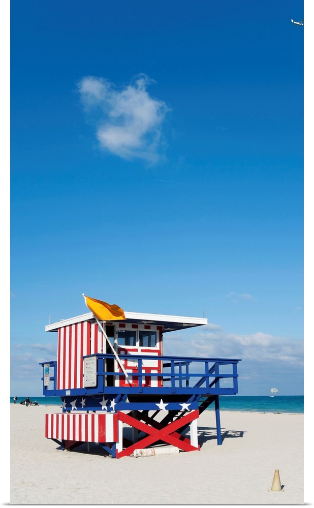 United States, USA, Florida, Miami Beach, A plane and a cloud over an American beach hut
