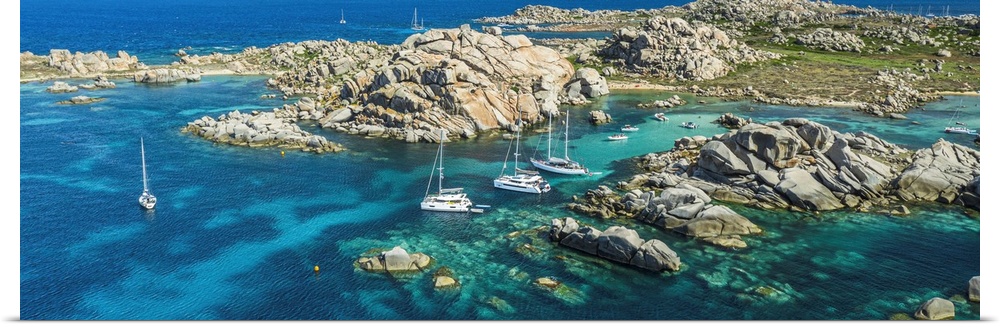 France, Corsica, Parc International Marin des Bouches de Bonifacio, Lavezzi Islands, Boats at anchor, white sands in natur...