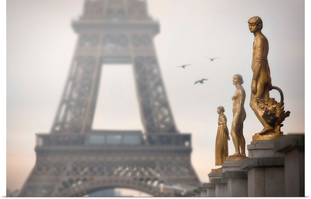 France, Paris, Eiffel Tower and statues of Palais de Chaillot.