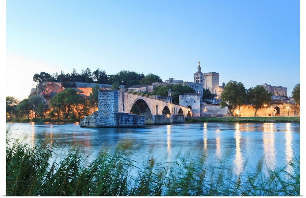France, Provence, Avignon, The old Pont Sant Benezet on the Rhone river with Pope Palace (Palais des Papes) in the back.
