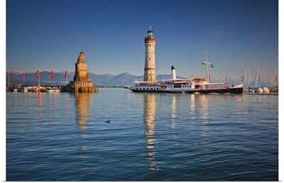 Germany, Lake Constance, Swabia, Lighthouse and a passenger ship
