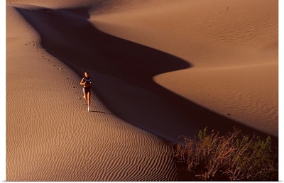Girl running in desert