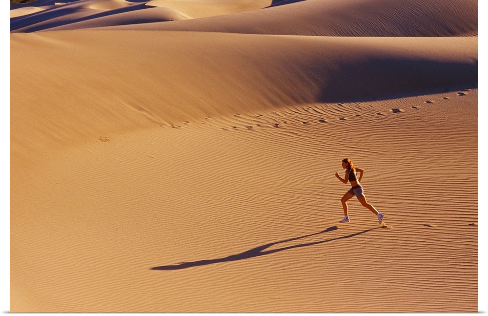 Girl running in desert, Death Valley