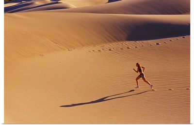 Girl running in desert, Death Valley