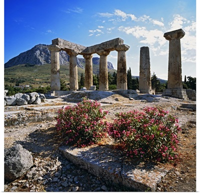 Greece, Corinth, Doric temple of Apollo, fortress of Acrocorintho in background