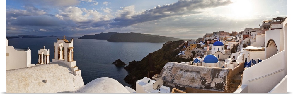 Greece, Aegean islands, Cyclades, Santorini island, Greek Islands, Oia village, typical church bells overlooking the sea.