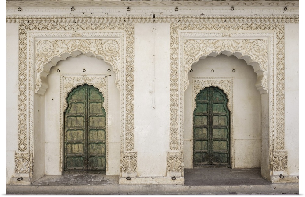 India, Rajasthan, Jodhpur, Two intricately decorated doorways in one courtyard inside Mehrangarh Fort.
