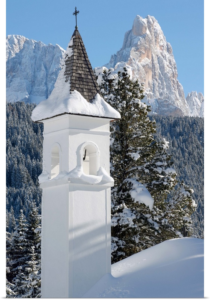 Italy, Dolomites, church and Pale di San Martino range in background