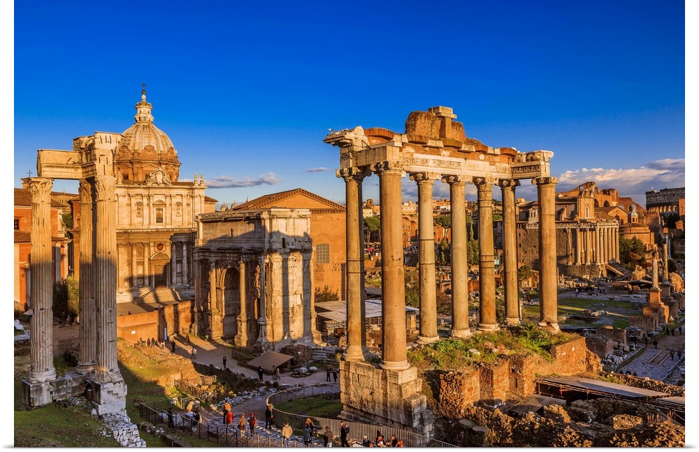 Italy, Latium, Roma district, Rome, Roman Forum, Foro Romano Temple of Saturn and Arch of Septimius Severus.