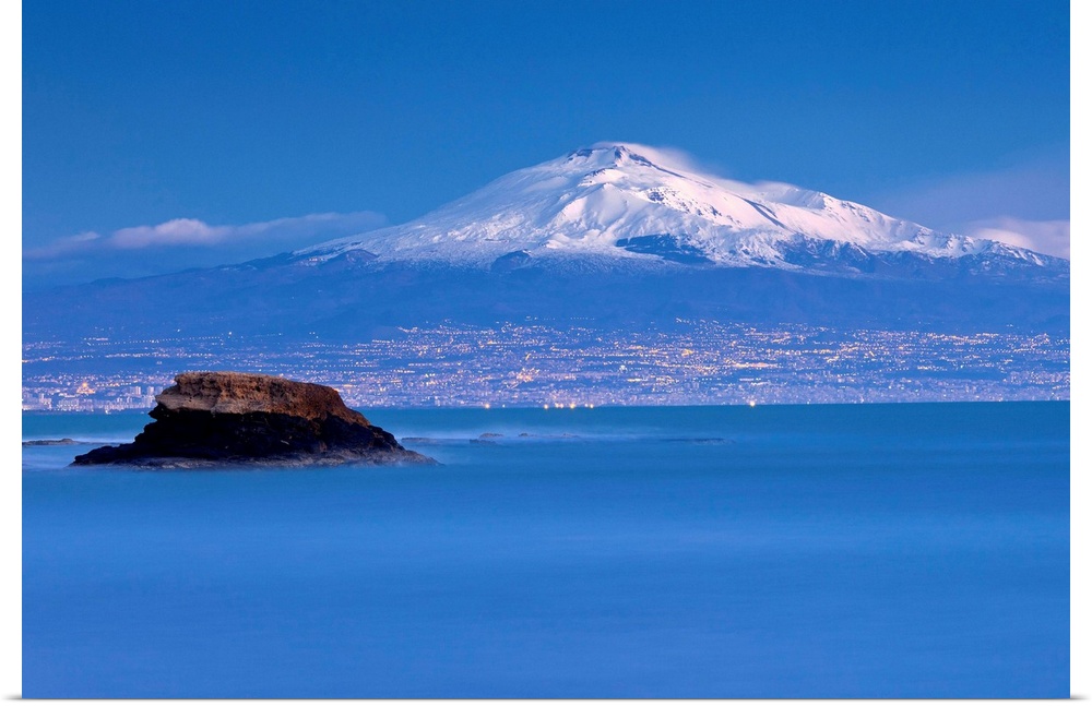 Italy, Sicily, Catania district, Mediterranean sea, Catania, Baia del Silenzio, view towards Catania and Mount Etna