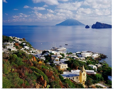 Italy, Sicily, Panarea island, view towards village of San Pietro, Basiluzzo islet