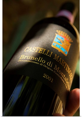 Italy, Tuscany, Castelli Martinozzi wine cellar, Brunello di Montalcino wine bottle