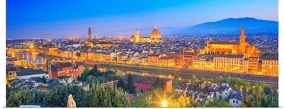 Italy, Tuscany, Florence, City illuminated at dusk