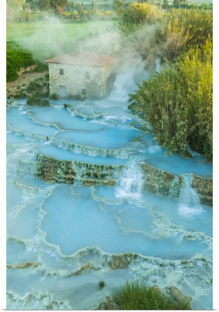 Italy, Tuscany, Grosseto district, Maremma, Saturnia, Aerial view of the thermal baths in Saturnia at sunrise.