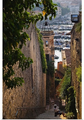 Italy, Tuscany, Maremma, steep footstep leading to the harbour in Porto Ercole