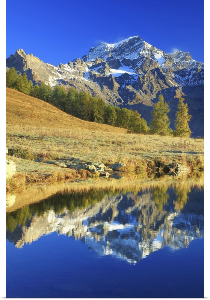 Italy, Aosta Valley, Aosta district, Valle del Gran San Bernardo, Valpelline, Alps, The Grand Combin is reflected in a sma...