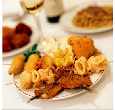Italy, Venice, Calle delle Botteghe, Al Bacareto restaurant, fried fish