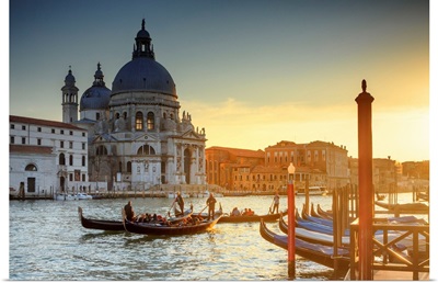 Italy, Venice, Gondolas And The Santa Maria Della Salute Church At Sunset