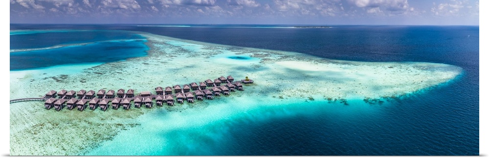 Maldives, Ari Atoll, Indian ocean, South Alifu Atoll, breathtaking aerial view of Moofushi reef and the suspended houses i...