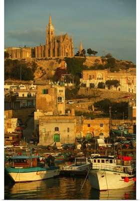 Malta, Mgarr, Gozo, view of the port and Our Lady of Lourdes church in background