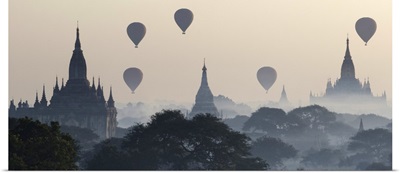Myanmar, Hot air balloons flying over the Buddhist temples in the plain of Bagan