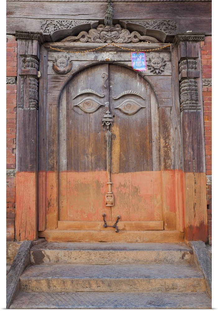 Nepal, Central, Kathmandu, Lord Buddha's lowered eyes carved on a wooden door, Hanuman Dhoka, old Royal Palace.