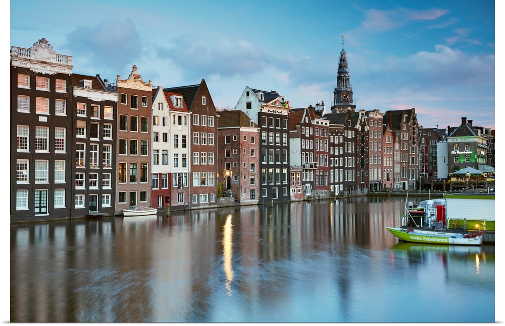 Netherlands, North Holland, Amsterdam, Typical Dutch houses along the Damrak Canal.