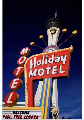 Nevada, Las Vegas, Motel sign and Stratosphere Tower in background