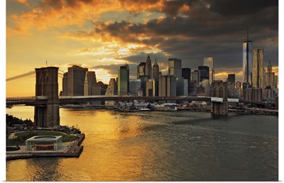 New York City, East River, Brooklyn Bridge, Downtown skyline at sunset